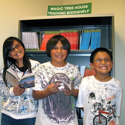 Happy kids enjoying their Magic Tree House Books