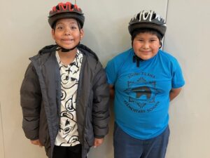 Zuni students wear new helmets