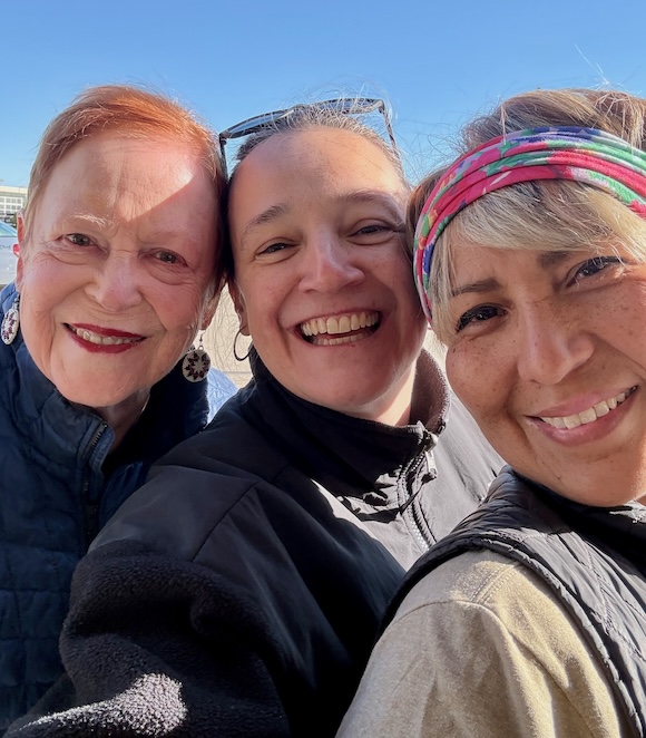 Eve's Fund leaders and volunteers at 2026 Shiprock Marathon tent
